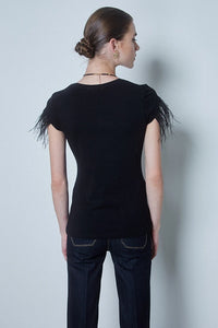 T-shirts with prints and feathers
